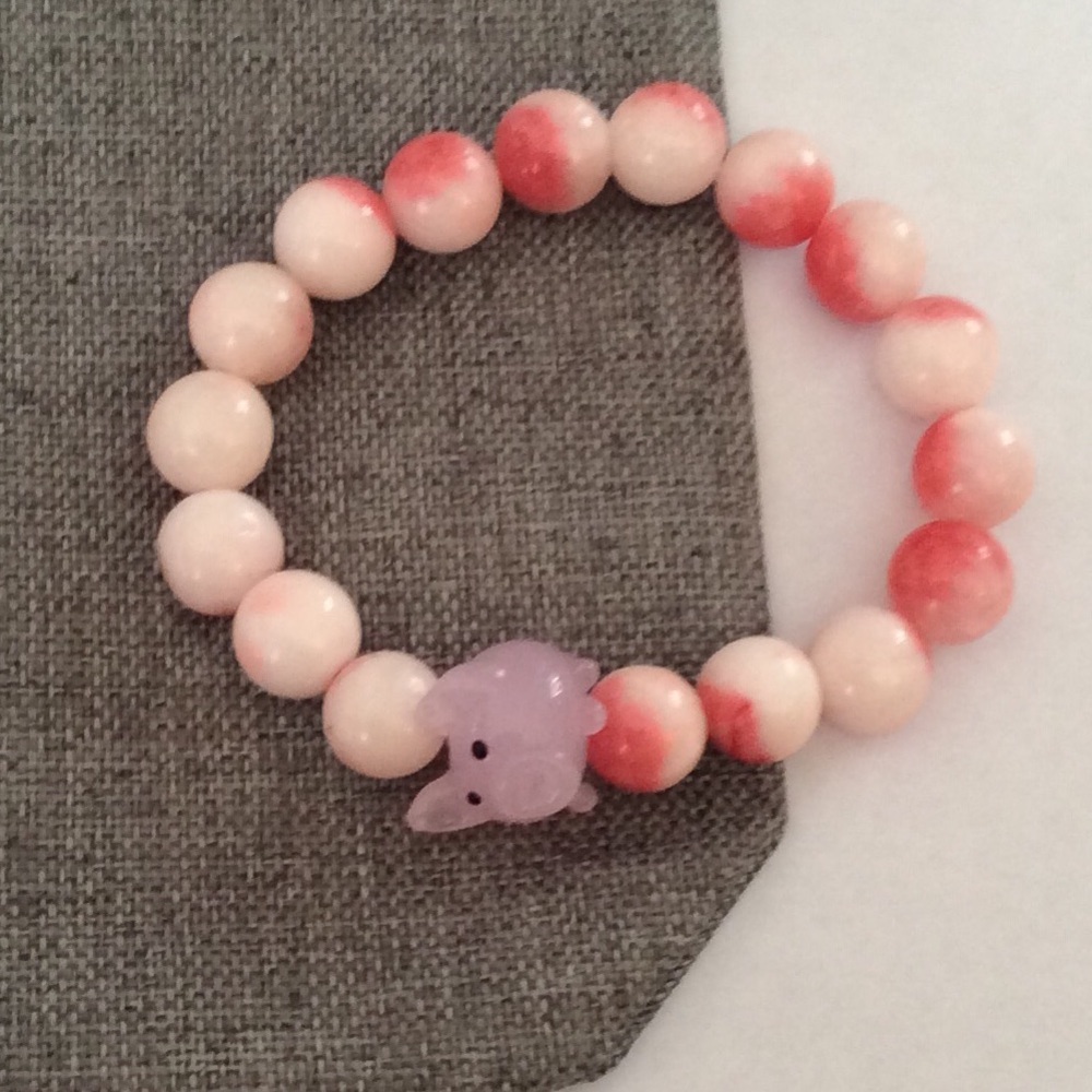Stunning Pink Pig stretch bracelet.